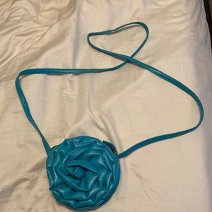 Blue zippered purse with pink interior